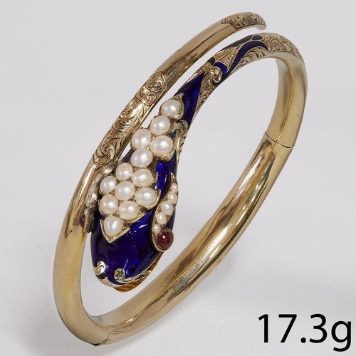 193 - VICTORIAN ENAMEL AND PEARL SNAKE HINGED BANGLE,
17.3 grams, high carat gold.
Vibrant blue enamel in ... 