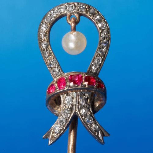 204 - FINE ANTIQUE PEARL DIAMOND AND RUBY BOW STICK PIN,
High carat gold.
Bright and lively diamonds.
Vibr... 