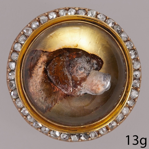 212 - DIAMOND ESSEX CRYSTAL REVERSE INTAGLIO DOG BROOCH
13 grams high carat gold 
lively diamonds 
2.8 cm ... 