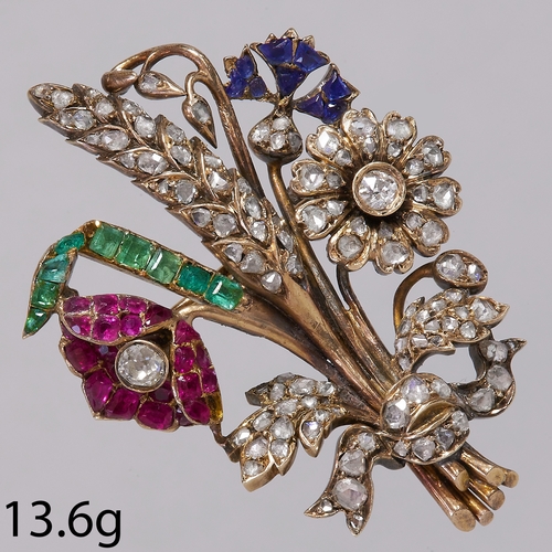 217 - ANTIQUE DIAMOND RUBY SAPPHIRE AND EMERALD FLORAL SPRAY BROOCH,
13.6 grams.
Diamonds bright and livel... 