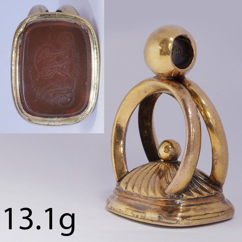 22 - ANTIQUE GOLD FOB SEAL,
13.1 grams, testing high carat gold.
The seal with monogram.
H. 3.4 cm.