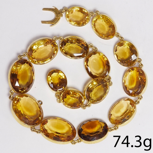 221 - LARGE ANTIQUE CITRINE NECKLACE,
74.3 grams, High carat gold.
The links with a large citrine, graduat... 