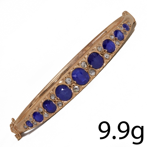 229 - SAPPHIRE AND DIAMOND HINGED BANGLE, 
9.9 grams, high carat gold.
Vibrant sapphires, totalling approx... 