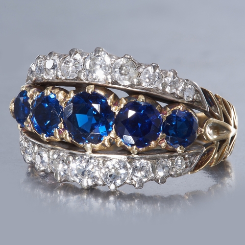 37 - SAPPHIRE AND DIAMOND RING.
6.4 gram. 
Set with vibrant sapphires totalling approx. 2.44 ct.
Bright a... 