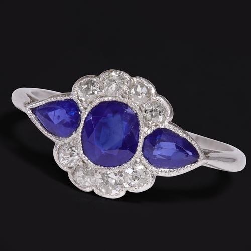 40 - ART-DECO SAPPHIRE AND DIAMOND RING,
2,7 grams, testing platinum.
Vibrant blue sapphires, totalling a... 