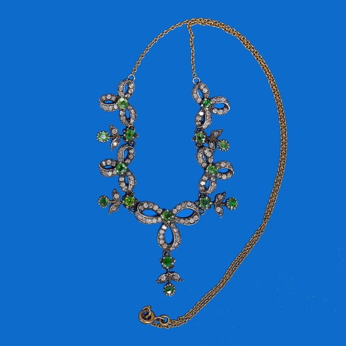 53 - BELLE EPOQUE DIAMOND AND GREEN GARNET NECKLACE,
8 grams.
Diamonds bright and lively, totalling appro... 