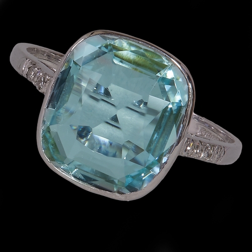 56 - AQUAMARINE AND DIAMOND RING,
2.9 grams, 18 ct. gold.
Large aquamarine of approx. 2.61 ct.
Diamonds b... 