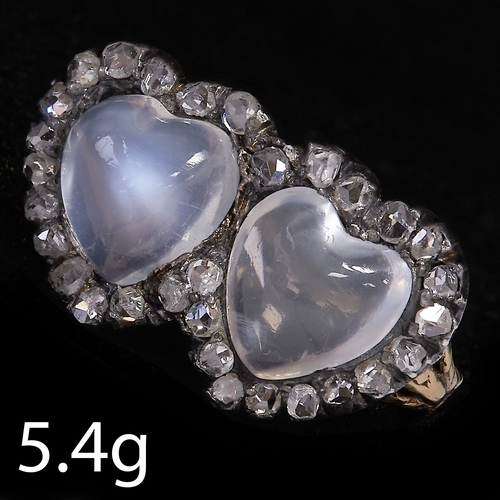 76 - VICTORIAN MOONSTONE AND DIAMOND DOUBLE HEART RING,
5.4 grams, testing 15 ct. gold.
Well matched moon... 