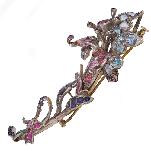 102 - IMPRESSIVE LARGE MULTI GEM FLOWER BROOCH, INCLUDING, SAPPHIRES, RUBIES, EMERALDS AND TOURMALINES 
35... 