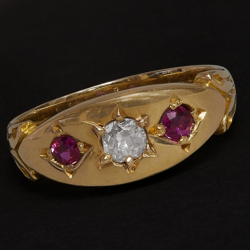 138 - RUBY AND DIAMOND 3-STONE GOLD GYPSY RING,
Vibrant rubies.
Bright and lively diamond.
Size J.