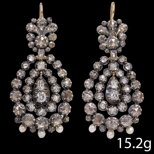 142 - FANTASTIC PAIR OF ANTIQUE DIAMOND AND PEARL EARRINGS, Likely Georgian.
15.2 grams.
Articulated cente... 