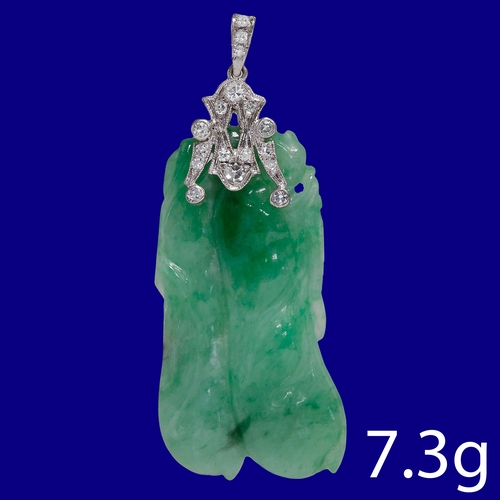 201 - CHINESE CARVED JADE AND DIAMOND PENDANT
7.3 grams.
Fine carved on both sides.
Diamond set bail and m... 