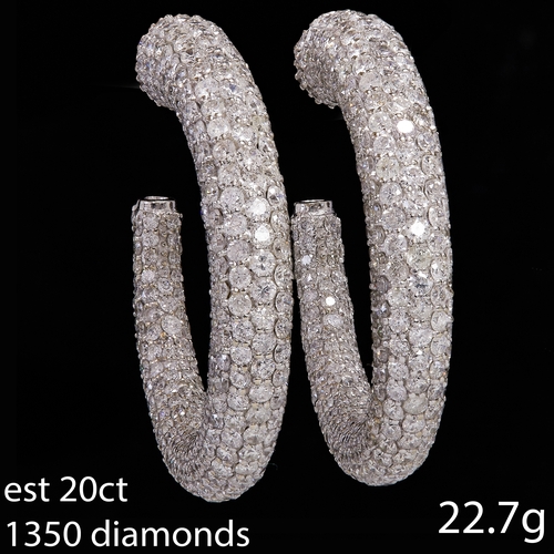 203 - FINE AND ELEGANT PAIR OF DIAMOND HALF HOOP EARRINGS,
22.7 grams, 18 ct. gold.
Fully pave set with br... 