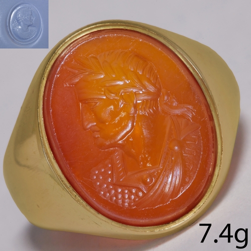 26 - 19TH CENTURY CARVED INTAGLIO RING.
7.4 gram, 15 ct. gold.
The intaglio carving presumed to depict em... 