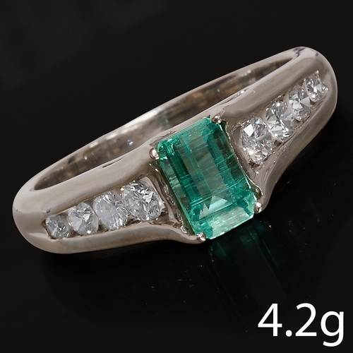 121 - EMERALD AND DIAMOND RING,
4.2 grams, testing 18 ct. gold.
Emerald ofg approx. 0.64 ct.
Diamonds on t... 