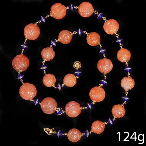 200 - UNUSUAL ANTIQUE CARVED CARNELIAN AND ENAMEL BEAD NECKLACE,
124 grams. 18 ct. gold.
The carnelians gr... 