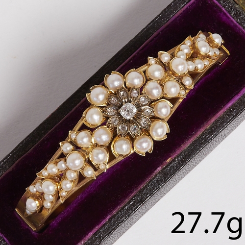 24 - VICTORIAN PEARL AND DIAMOND BANGLE.
27.7 grams. High carat gold.
Pearls well matched and unusual lar... 