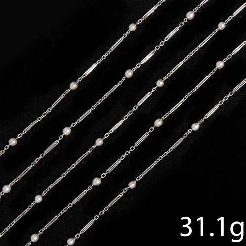 66 - EDWARDIAN PLATINUM AND PEARL LONG GUARD CHAIN,
31.1 grams,
Set with 40 pearls (untested, assumed be ... 