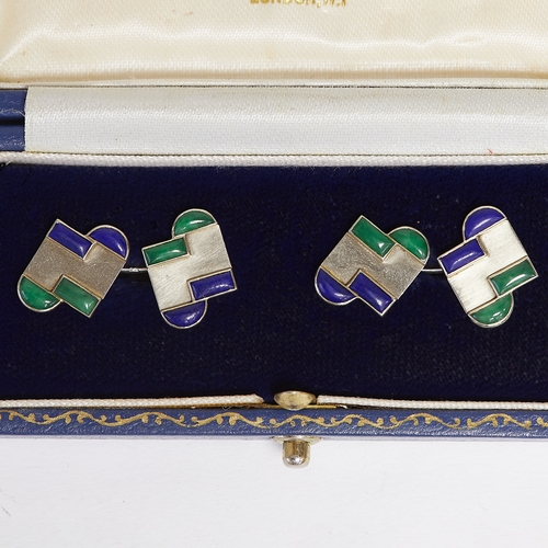 85 - RAYMOND TEMPLIER, PAIR OF ART DECO JADE AND LAPIS LAZULI CUFFLINKS, CA. 1920
6.6 grams, 18 ct. gold.... 