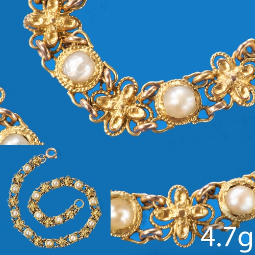 28 - GEORGIAN GOLD PEARL BRACELET. 
4.7 grams.
Set with pearls in a floral openwork design (untested).
L.... 