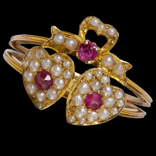 29 - PEARL AND RUBY DOUBLE HEART GOLD RING,
Fine pearls.
Size M 1/2.