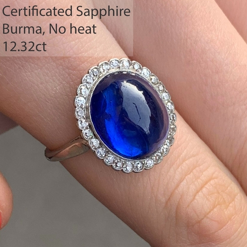 54 - CERTIFICATED 12.32 CT. BURMA SAPPHIRE AND DIAMOND CLUSTER RING, 
7.5 grams.
Rich and vibrant cabocho... 