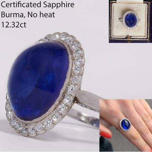 54 - CERTIFICATED 12.32 CT. BURMA SAPPHIRE AND DIAMOND CLUSTER RING, 
7.5 grams.
Rich and vibrant cabocho... 