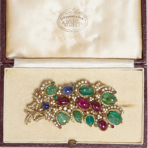 190 - LARGE AND RARE TUTTI-FRUTTI EMERALD RUBY SAPPHIRE AND DIAMOND BROOCH
55.2 grams.
Gemstones totalling... 