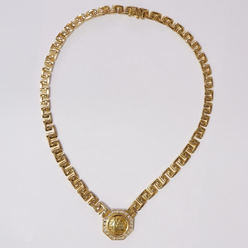 62 - IMPORTANT VINTAGE DIAMOND AND GOLD COIN NECKLACE 
72.5 grams, 18 ct. gold.
The coin 18 ct. gold or h... 