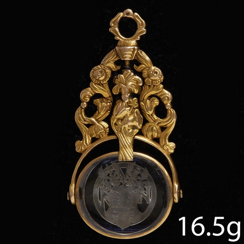 96 - ANTIQUE ROCK CRYSTAL SWIVEL FOB SEAL.
16.5 gams, testing high carat gold.
One side with a fine intag... 