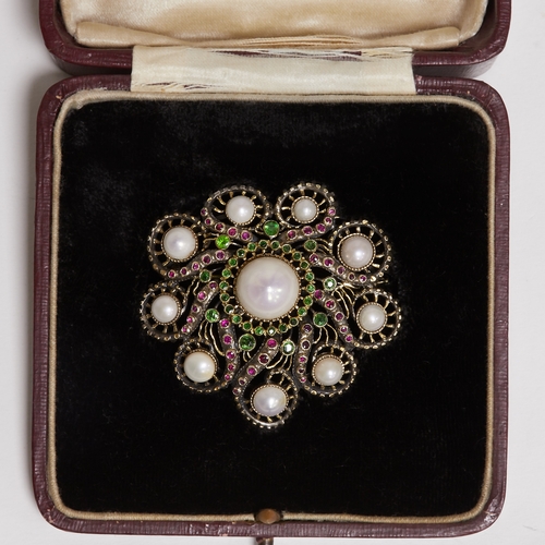 130 - KARL ROTHMULLER (attrib.), CERTIFICATED NATURAL SALTWATER PEARL RUBY AND DEMANTOID GARNET BROOCH,
27... 