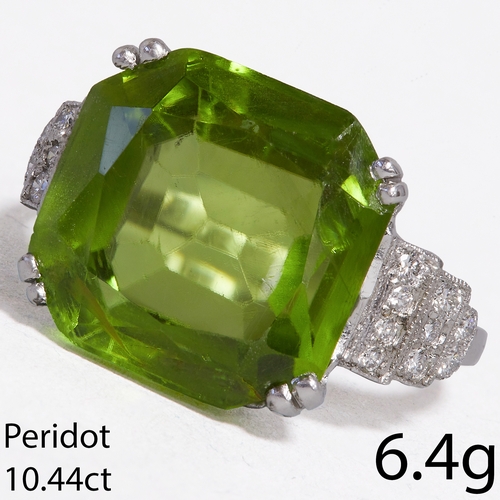 116 - PERIDOT AND DIAMOND RING,
6.4 grams, testing 18 ct. gold.
Rich and vibrant peridot with great clarit... 