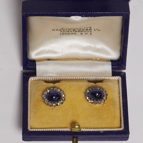 106 - PAIR OF SAPPHIRE AND DIAMOND CLUSTER EARRINGS, 
3.3 grams.
Each set with a cabochon cut blue sapphir... 