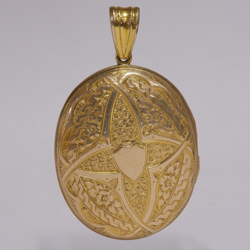 124 - VICTORIAN GOLD LOCKET PENDANT,
16.9 grams.
Front and back with relief and engraved decoration.
L. 5.... 