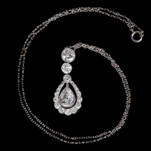 219 - FINE EDWARDIAN DIAMOND PENDANT NECKLACE,
4.8 grams.
Diamonds totalling approx. 2.55 ct.
L. pendant