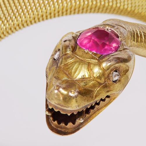 250 - VICTORIAN PINK SAPPHIRE AND DIAMOND SNAKE BANGLE,
30.1 grams, 15 ct. gold
Vibrant pink sapphire of a... 