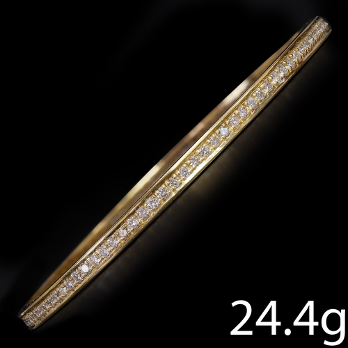 124 - DIAMOND FULL ETERNITY BANGLE,
24.4 grams, Testing 18 ct. gold.
Diamonds bright and lively, totalling... 