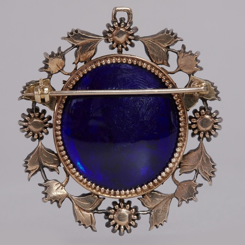 131 - GEORGIAN ENAMEL AND DIAMOND BROOCH,
29.3 grams.
Floral diamond set section, largest diamond approx. ... 