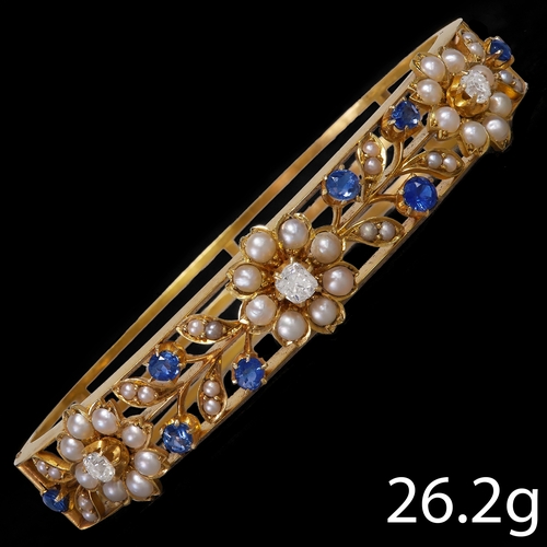 161 - ANTIQUE PEARL, SAPPHIRE AND OLD CUT DIAMOND BANGLE
26.2 grams . High carat gold.
Set with vibrant sa... 