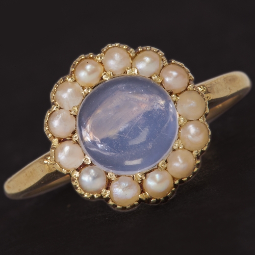 211 - ANTIQUE MOONSTONE AND PEARL CLUSTER RING,
Testing high carat gold.
Vibrant moonstone with nice blue ... 