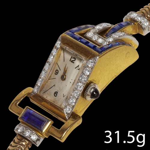 29 - UNUSUAL SAPPHIRE AND DIAMOND COCKTAIL WATCH,
31.5 grams, testing 18 ct. gold and gold strap.
Fine sa... 