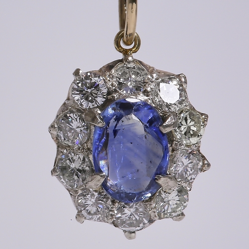 51 - SAPPHIRE AND DIAMOND PENDANT,
Vibrant sapphire.
Gemstones totalling approx. 1.10 ct.