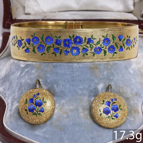 6 - VICTORIAN ENAMEL BANGLE AND EARRINGS SUITE,
17.3 grams, 18 ct. gold.
The bangle and earrings both wi... 