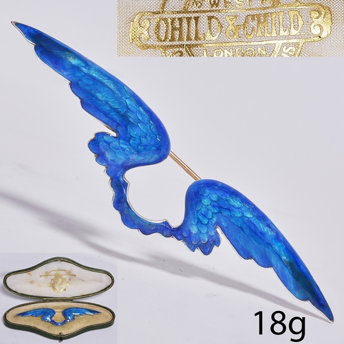 8 - CHILD AND CHILD, ENAMEL WING BROOCH,
18 grams,
The large wings with fine translucent blue enamel.
Ma... 