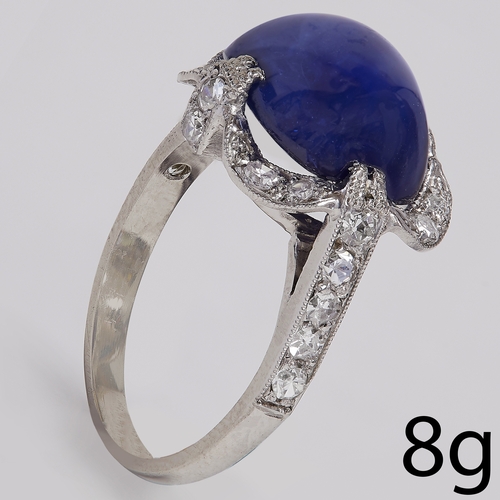 85 - ART-DECO SUGAR LOAF SAPPHIRE AND DIAMOND CLUSTER RING,
8 grams. Platinum.
Fine sugar loaf cut sapphi... 