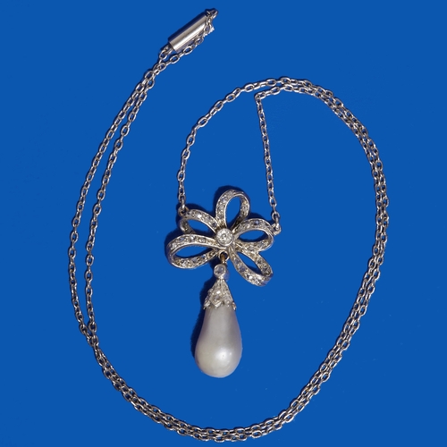 93 - BELLE EPOQUE CERTIFICATED NATURAL SALTWATER PEARL AND DIAMOND BOW PENDANT NECKLACE,
6.4 grams.
Pearl... 