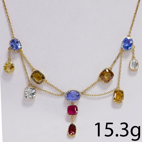 11 - EDWARDIAN MULTI COLOUR GEMSTONE NECKLACE, 
13.6 grams, testing 18 ct. gold.
Vibrant sapphires totall... 