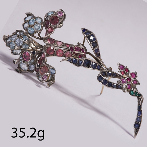 120 - IMPRESSIVE LARGE MULTI GEM FLOWER BROOCH, INCLUDING, SAPPHIRES, RUBIES, EMERALDS AND TOURMALINES 
35... 