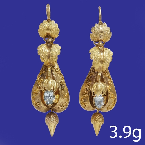 134 - PAIR OF VICTORIAN EARRINGS,
3.9 grams. High carat gold.
Each set with a paste.
L. 4.4 cm.