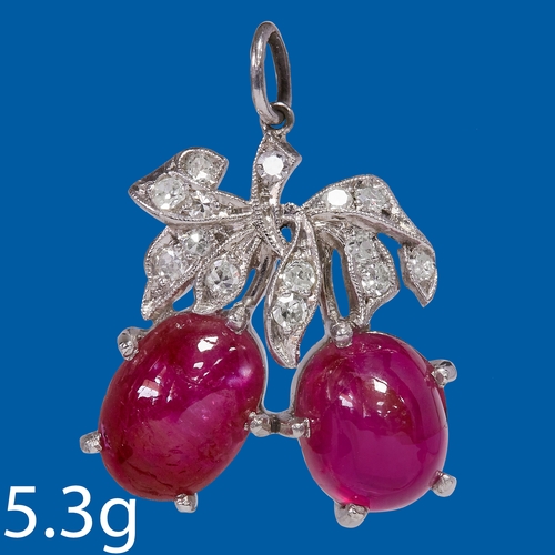 148 - RUBY AND DIAMOND FRUIT PENDANT,
5.3 grams, High carat gold.
Vibrant rubies, totalling approx. 8 ct. ... 